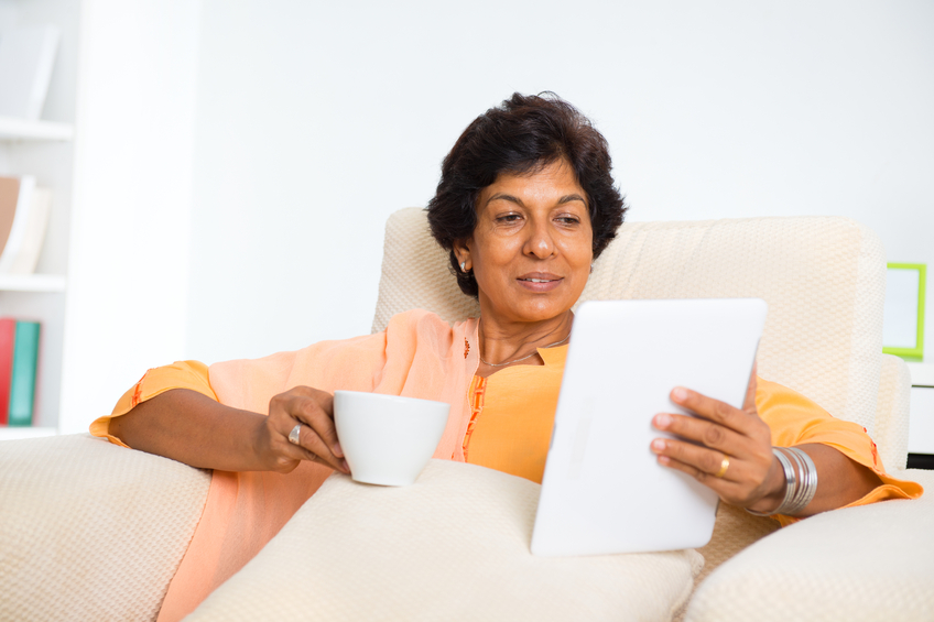 woman reading tablet